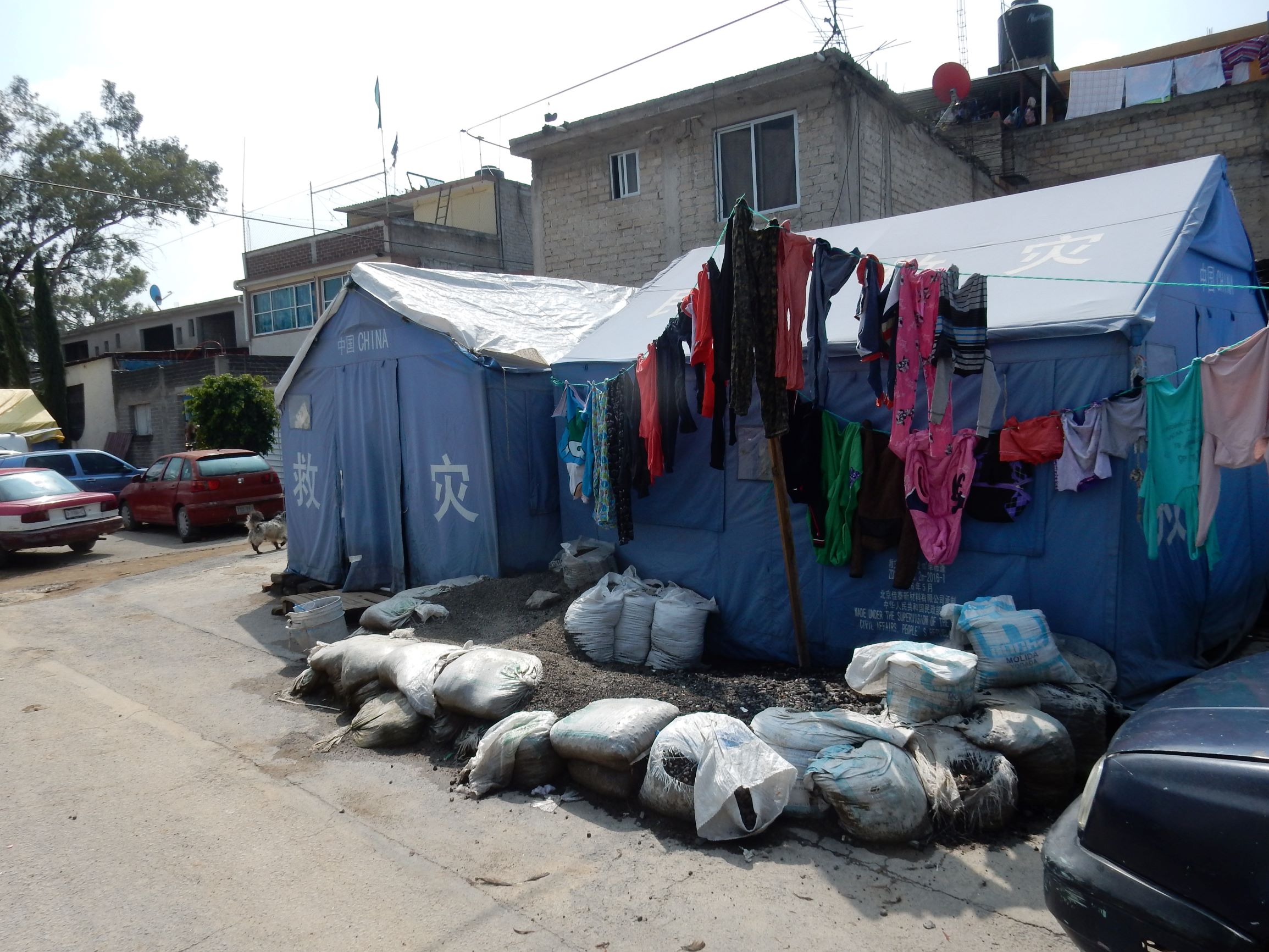 A year after the earthquake, displaced people in Iztapalapa are living in tents at risk of flooding and disease